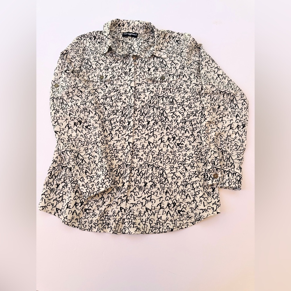 Woman’s Karl Lagerfeld Paris Blouse Size Small
White With Black Lettering​​​